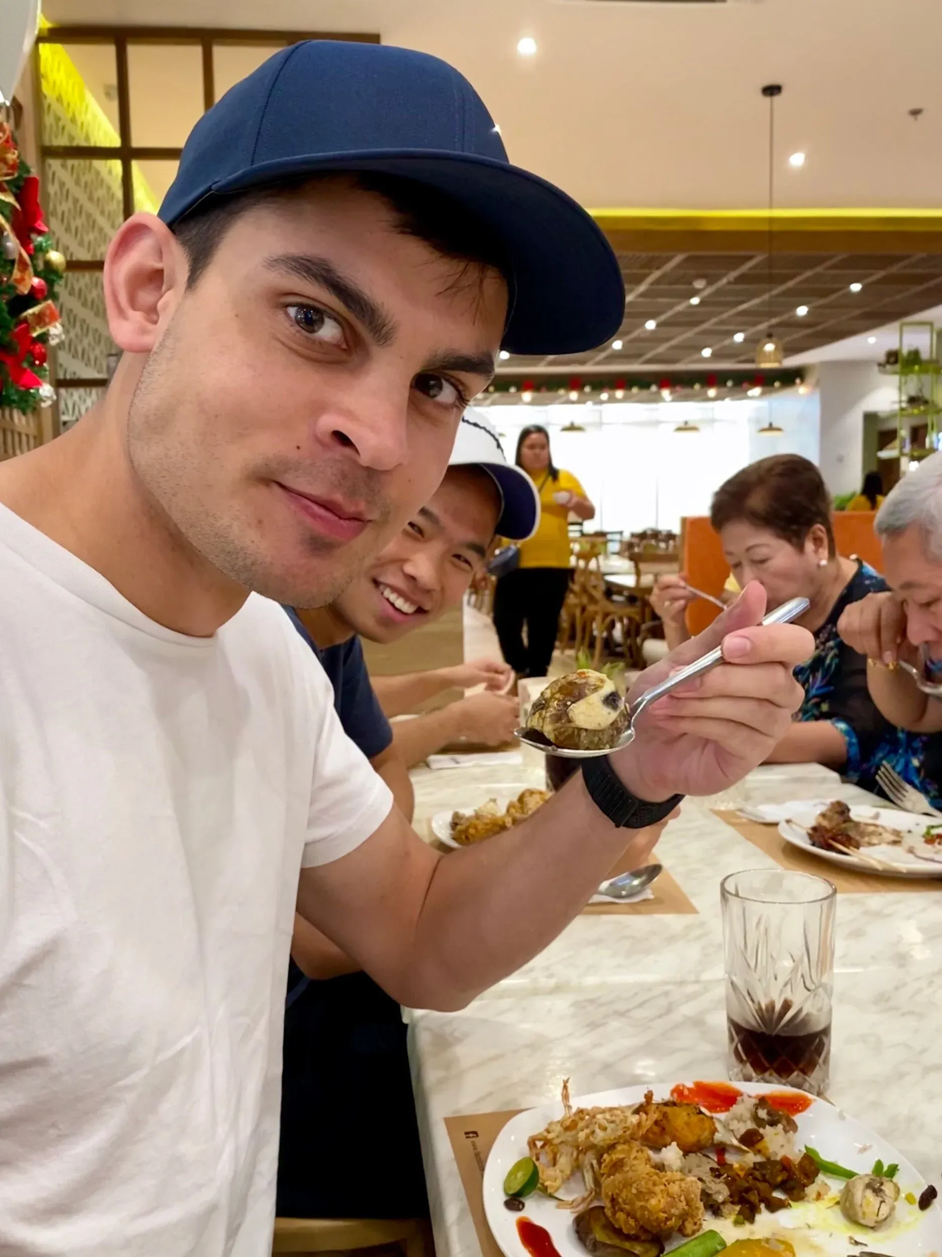 We then met Adrian’s uncles family for church and lunch before continuing. Here is me trying Balut a traditional dish (Fertilized chicken egg).