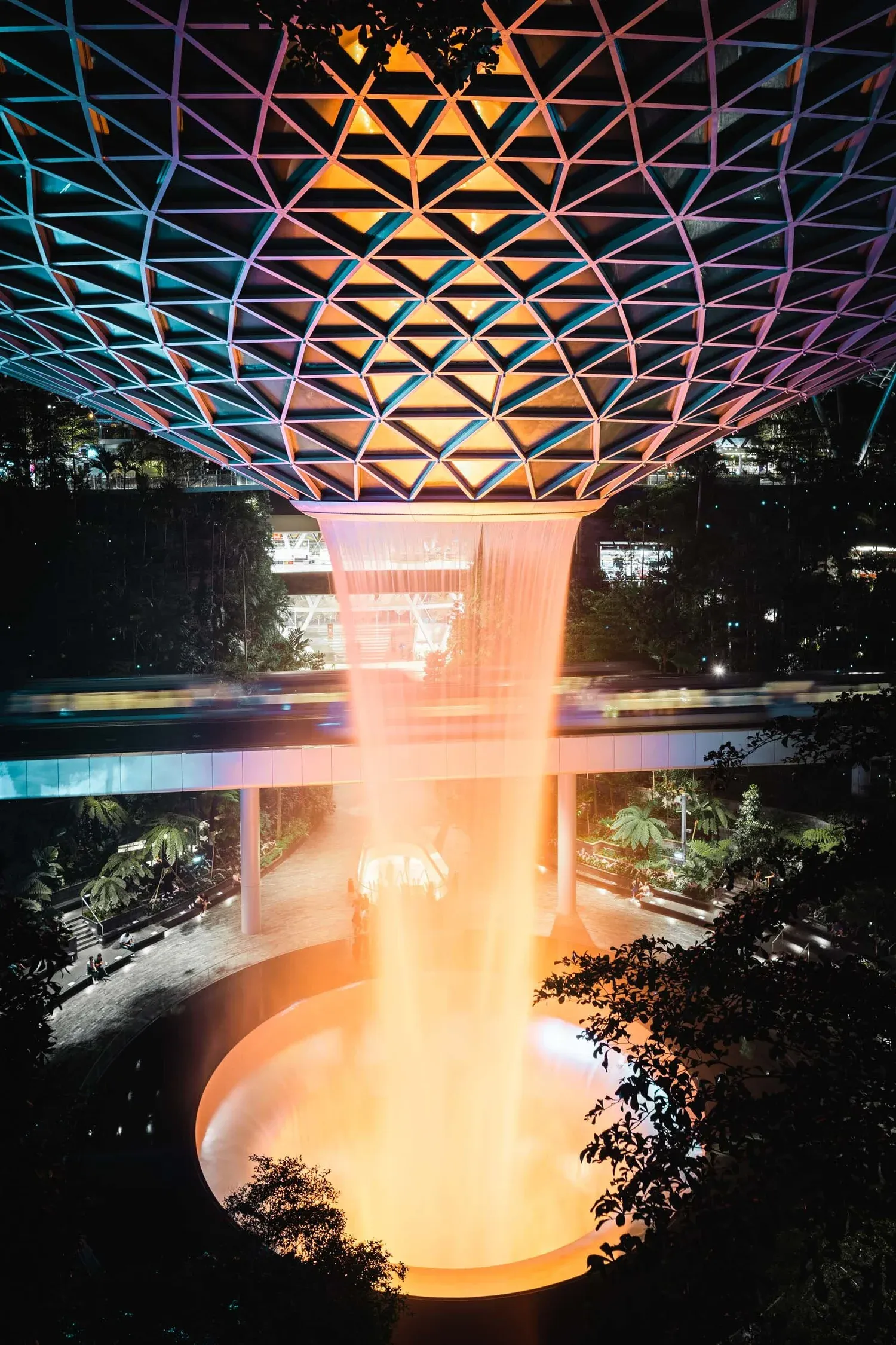 Colored glass casting jewel-toned light into an interior.